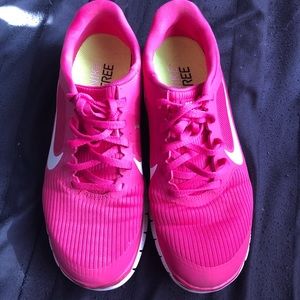 Hot pink Nike shoes